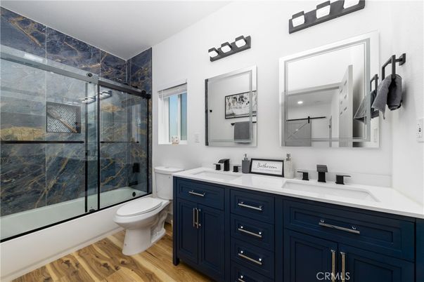 Bathroom, Dual Sink Vanities, Glass Shower, Interior, Wood Texture Flooring