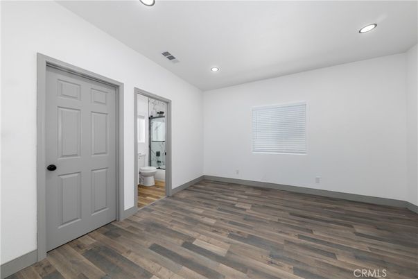 Bathroom, Empty room, Glass Shower, Interior, Recessed Lighting, Wood Texture Flooring