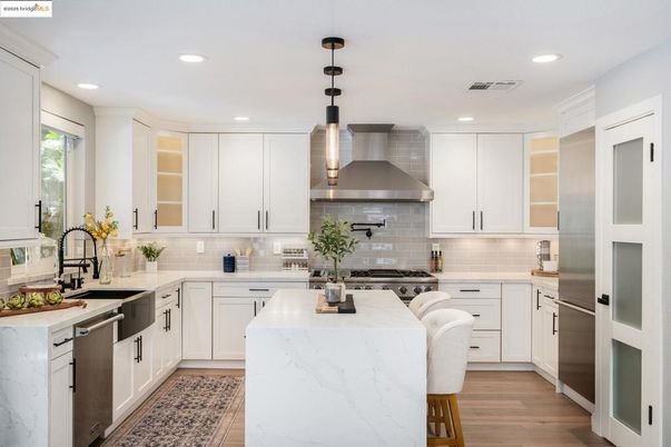 Interior, Kitchen, Pendant Lights, Recessed Lighting, Stainless Steel Appliances, Wood Texture Flooring