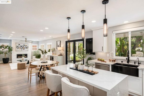 Dining room, Fireplace, Interior, Kitchen, Living room, Pendant Lights, Recessed Lighting, Stone Walls, Wood Texture Flooring