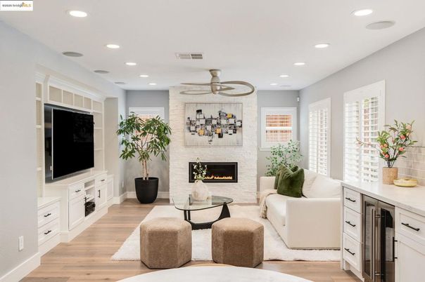Fireplace, Interior, Living room, Recessed Lighting, Stone Walls, Wood Texture Flooring