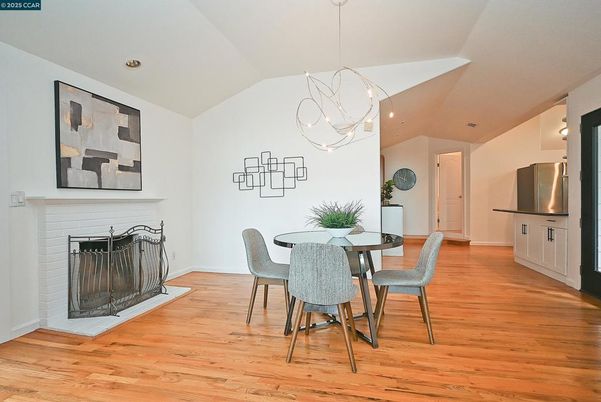 Dining room, Fireplace, Interior, Pendant Lights, Recessed Lighting, Wood Texture Flooring