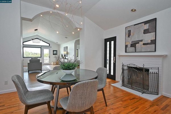 Dining room, Fireplace, Interior, Pendant Lights, Recessed Lighting, Wood Texture Flooring