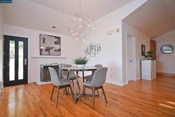 Dining room, Fireplace, Interior, Pendant Lights, Wood Texture Flooring