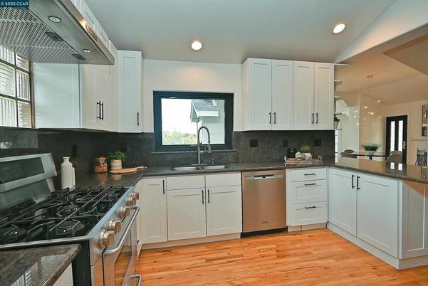 Interior, Kitchen, Pendant Lights, Recessed Lighting, Stainless Steel Appliances, Wood Texture Flooring
