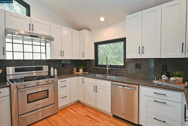 Interior, Kitchen, Recessed Lighting, Stainless Steel Appliances, Wood Texture Flooring
