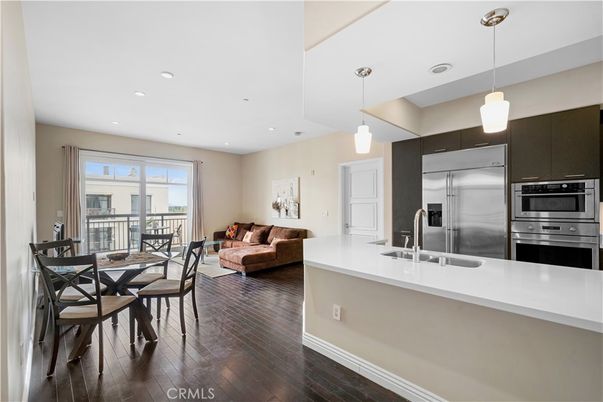 Dining room, Interior, Kitchen, Living room, Pendant Lights, Recessed Lighting, Stainless Steel Appliances, Wood Texture Flooring