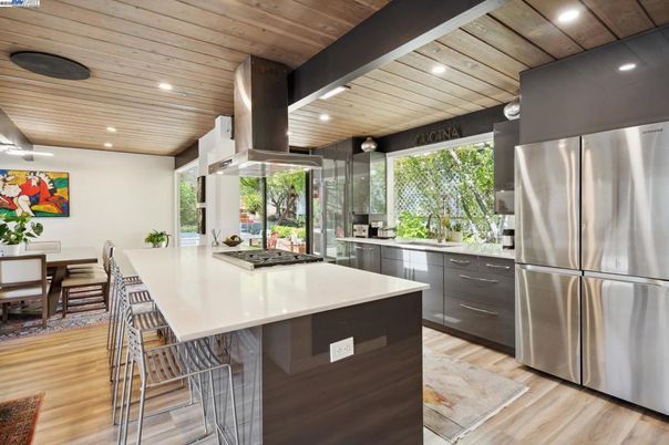 Dining room, Interior, Kitchen, Recessed Lighting, Stainless Steel Appliances, Wooden Ceilings, Wood Texture Flooring