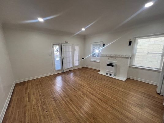 Empty room, Fireplace, Interior, Recessed Lighting, Wood Texture Flooring