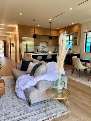 Dining room, Interior, Kitchen, Living room, Pendant Lights, Recessed Lighting, Stainless Steel Appliances, Wood Texture Flooring