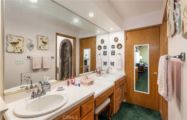 Bathroom, Dual Sink Vanities, Interior, Recessed Lighting, Tile Countertops