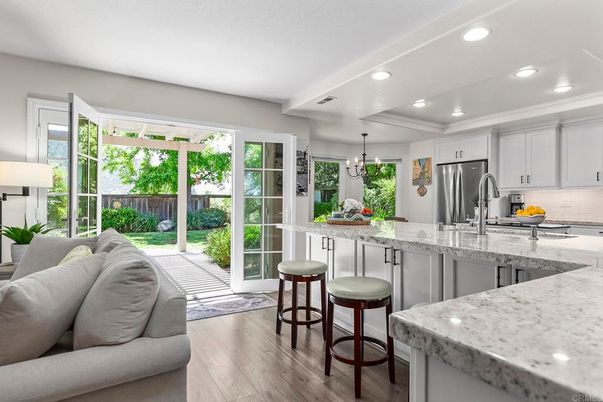 Chandelier, Interior, Kitchen, Pendant Lights, Recessed Lighting, Stainless Steel Appliances, Wood Texture Flooring