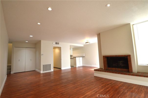 Empty room, Fireplace, Interior, Recessed Lighting, Wood Texture Flooring