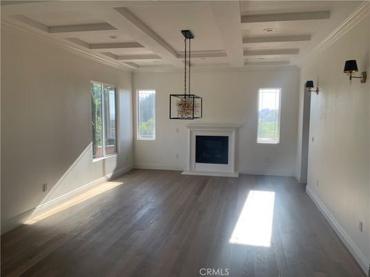 Empty room, Fireplace, Interior, Pendant Lights, Recessed Lighting, Wood Texture Flooring