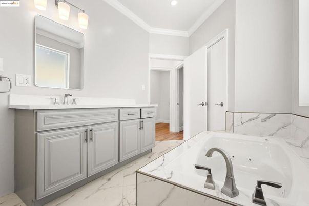 Bathroom, Dual Sink Vanities, Interior, Marble, Marble Walls, Recessed Lighting