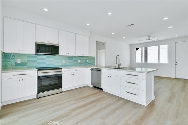 Interior, Kitchen, Recessed Lighting, Stainless Steel Appliances, Wood Texture Flooring