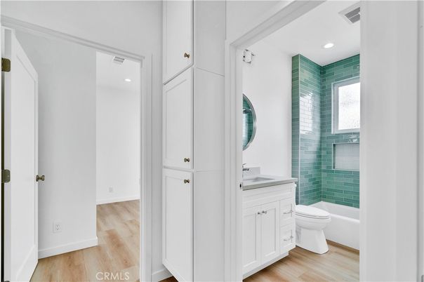 Bathroom, Glass Shower, Interior, Recessed Lighting, Wood Texture Flooring