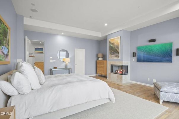 Bedroom, Fireplace, Interior, Recessed Lighting, Wood Texture Flooring