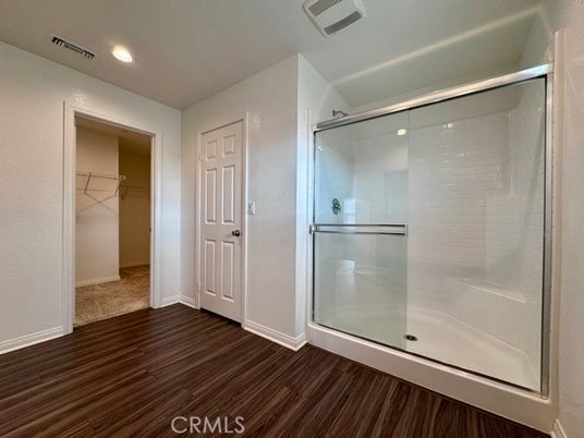 Bathroom, Glass Shower, Interior, Recessed Lighting, Walk-in Closets, Wood Texture Flooring