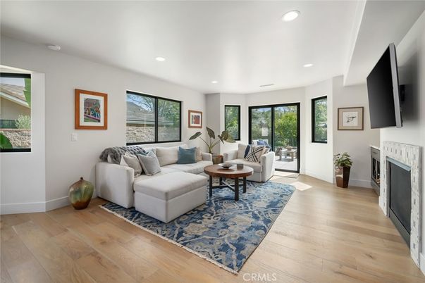 Fireplace, Interior, Living room, Recessed Lighting, Wood Texture Flooring