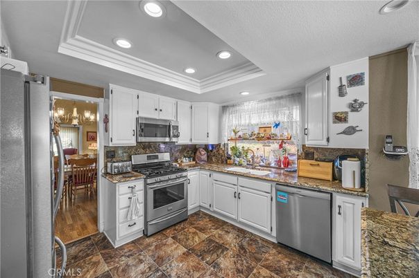 Chandelier, Dining room, Interior, Kitchen, Recessed Lighting, Stainless Steel Appliances