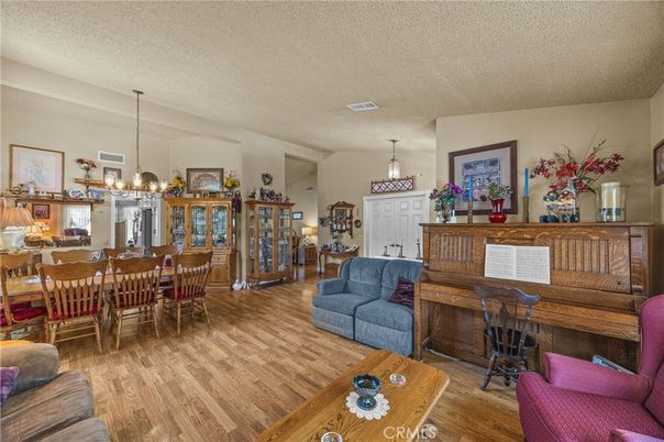 Dining room, Interior, Living room, Pendant Lights, Piano, Wood Texture Flooring