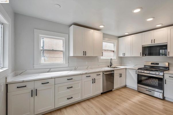 Interior, Kitchen, Recessed Lighting, Stainless Steel Appliances, Wood Texture Flooring