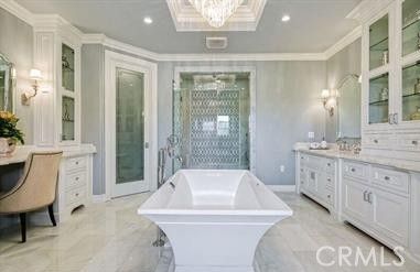 Bathroom, Chandelier, Free Standing Baths, Glass Shower, Interior, Recessed Lighting