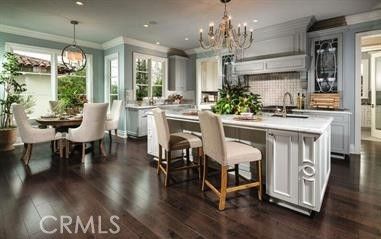 Chandelier, Dining room, Interior, Kitchen, Recessed Lighting, Stainless Steel Appliances, Wood Texture Flooring