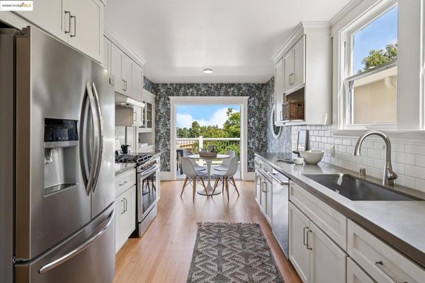 Dining room, Interior, Kitchen, Recessed Lighting, Stainless Steel Appliances, Wood Texture Flooring