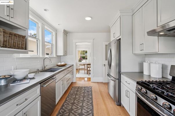 Dining room, Interior, Kitchen, Recessed Lighting, Stainless Steel Appliances, Wood Texture Flooring