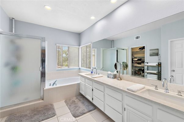 Bathroom, Dual Sink Vanities, Interior, Recessed Lighting, Walk-in Closets