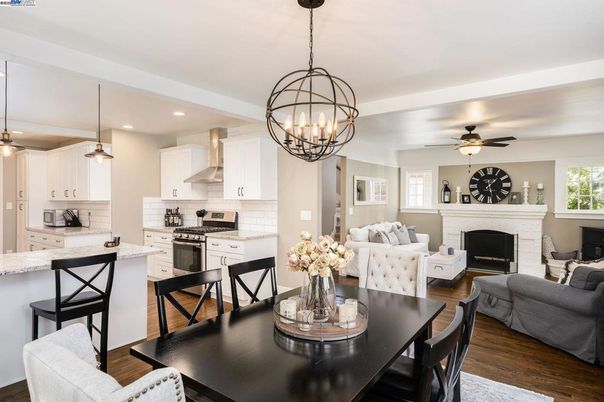 Chandelier, Dining room, Fireplace, Interior, Kitchen, Living room, Pendant Lights, Recessed Lighting, Wood Texture Flooring