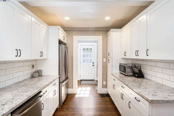 Interior, Kitchen, Recessed Lighting, Stainless Steel Appliances, Wood Texture Flooring