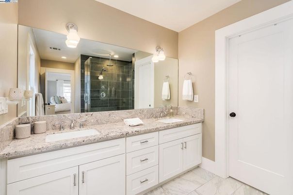 Bathroom, Dual Sink Vanities, Glass Shower, Interior, Marble, Recessed Lighting