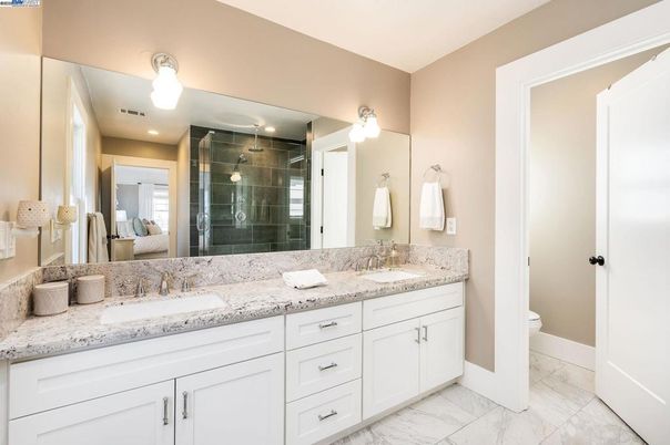 Bathroom, Dual Sink Vanities, Glass Shower, Interior, Marble, Recessed Lighting