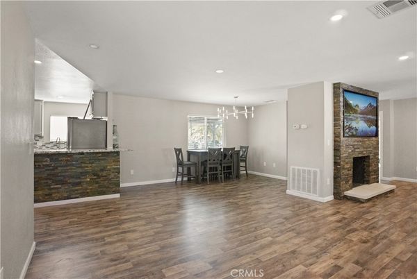 Dining room, Fireplace, Interior, Pendant Lights, Recessed Lighting, Wood Texture Flooring