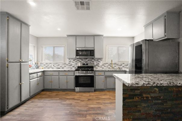 Interior, Kitchen, Recessed Lighting, Stainless Steel Appliances, Wood Texture Flooring