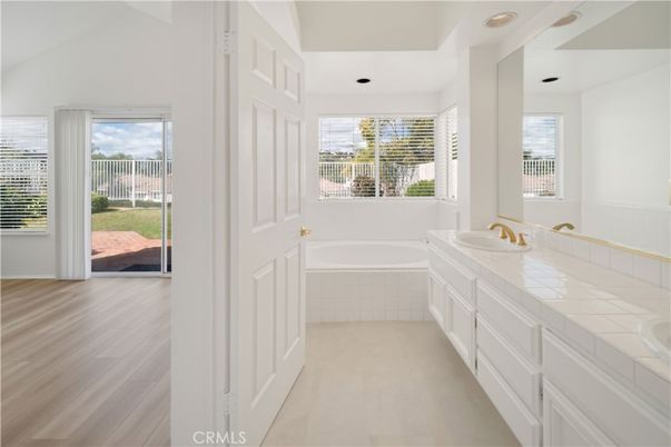 Bathroom, Interior, Recessed Lighting, Tile Countertops, Wood Texture Flooring
