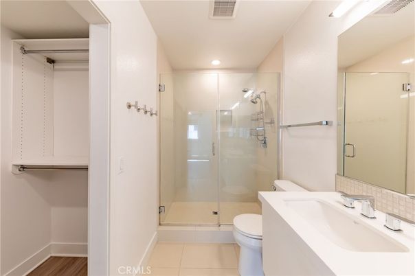 Bathroom, Glass Shower, Interior, Recessed Lighting, Wood Texture Flooring
