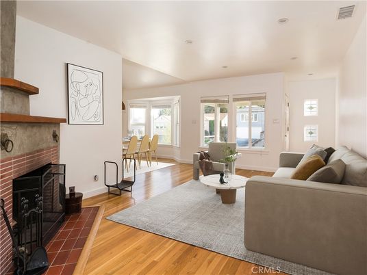 Dining room, Fireplace, Interior, Living room, Recessed Lighting, Wood Texture Flooring