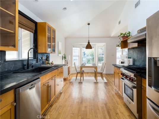 Dining room, Interior, Kitchen, Pendant Lights, Recessed Lighting, Stainless Steel Appliances, Wood Texture Flooring