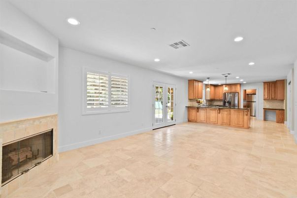 Fireplace, Interior, Kitchen, Pendant Lights, Recessed Lighting, Stainless Steel Appliances