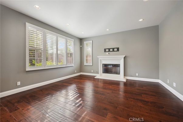 Empty room, Fireplace, Interior, Recessed Lighting, Wood Texture Flooring