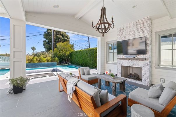 Chandelier, Fireplace, Interior, Living room, Pool, Stone Walls