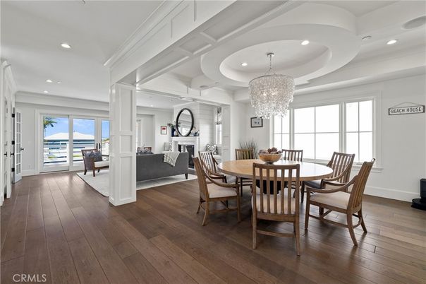 Chandelier, Dining room, Fireplace, Interior, Living room, Recessed Lighting, Wood Texture Flooring