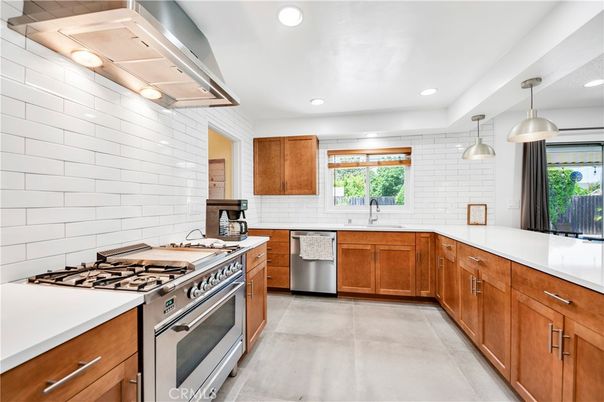 Interior, Kitchen, Pendant Lights, Recessed Lighting, Stainless Steel Appliances, Stone Walls