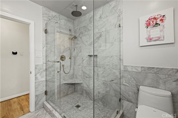 Bathroom, Glass Shower, Interior, Marble, Marble Walls, Recessed Lighting, Wood Texture Flooring