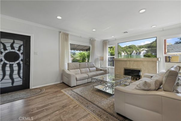Fireplace, Interior, Living room, Recessed Lighting, Wood Texture Flooring