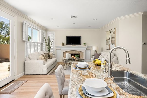 Dining room, Fireplace, Interior, Living room, Recessed Lighting, Wood Texture Flooring